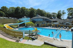 Seasonal Outdoor Swimming Pool with Slides at Finlake Par